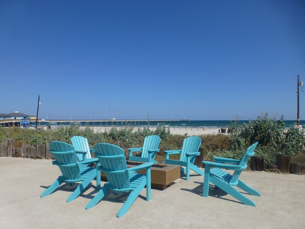 A fire pit surrounded by chairs.